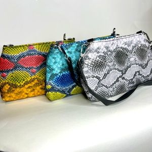 Faux snake skin handbags/ clutch